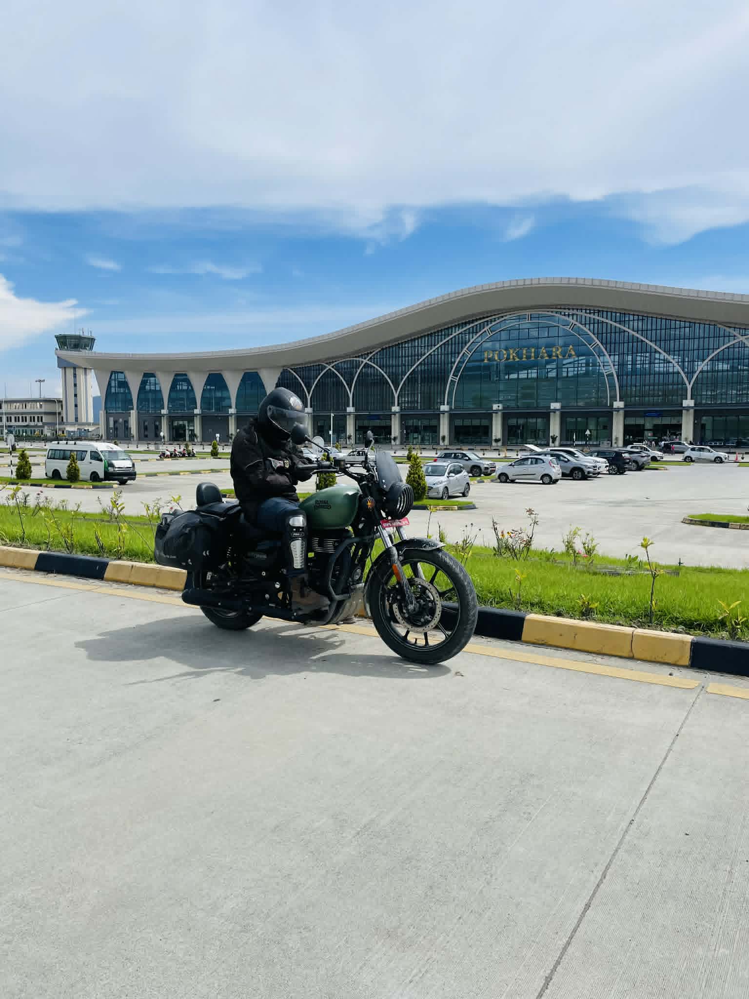 202605261601_Prabhash on his motorbike in front of Pokhara international airport.jpeg